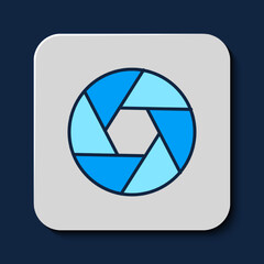 Filled outline Camera shutter icon isolated on blue background. Vector
