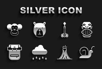 Set Cloud with rain, Mexican mayan or aztec mask, Snail, Volcano eruption, Hiking backpack, Arrow, Monkey and Bear head icon. Vector