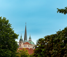 Fototapeta na wymiar St. Thomas Church and St. Nicholas Church in Prague, Czech Republic.
