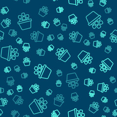 Green line Ice bucket filled with ice cubes icon isolated seamless pattern on blue background. Vector