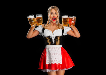 Beer for Oktoberfest from sexy girl in traditional german dirndl. Photography for advertising...