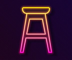 Glowing neon line Chair icon isolated on black background. Vector