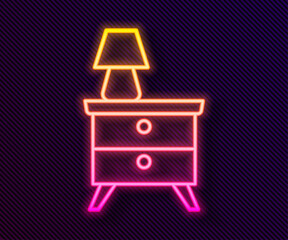 Glowing neon line Furniture nightstand with lamp icon isolated on black background. Vector