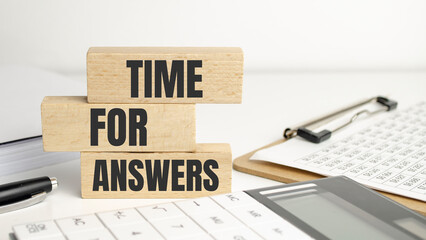 time for answers words on wooden blocks and office supplies