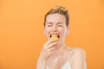 girl biting fruit girl biting apricot with pleasure