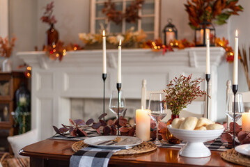 Thanksgiving dinner table decorated for fall - 530181539