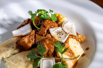 lomo saltado with corn and onion pie