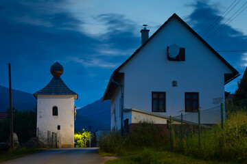 Obraz premium Historical bell tower in Ondrasova village, Slovakia.