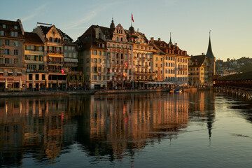 Fototapeta na wymiar Old buildings facades at riverside in Switzerland