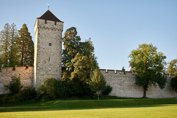 Fototapeta na wymiar Facade of Museggmauer city wall with tower in Switzerland