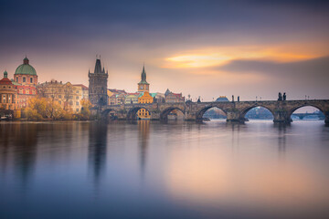 Fototapeta premium Charles bridge at sunset, peaceful medieval Prague, Czech Republic