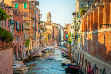 Fototapeta na wymiar Peaceful Canal scenary in romantic Venice at springtime, Italy