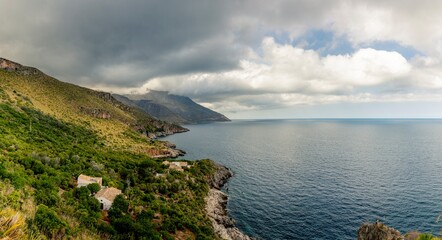 Fototapeta premium San Vito Lo Capo, Sicily - July 8, 2020: View from the coastal path of the Zingaro Natural Park, between San Vito lo Capo and Scopello, province of Trapani, Sicily, Italy