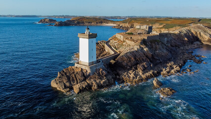 Aerial view of the lighthouse of Kermorvan west of Brest in Brittany, France - Square tower built at the end of a rocky cape facing the Atlantic Ocean - obrazy, fototapety, plakaty