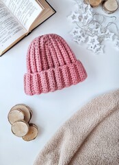 Fashionable knitted hats autumn-winter. The hat lies on a white background. Product layout. Buy a hat. Knitting. Hobby.