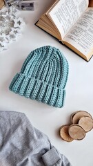 Fashionable knitted hats autumn-winter. The hat lies on a white background. Product layout. Buy a hat. Knitting. Hobby.