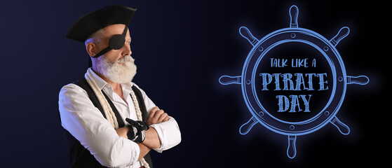 Mature pirate on dark background. Talk Like a Pirate Day