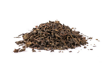 Pile of dry tea leaves on white background.