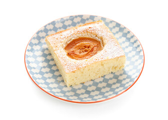 Plate with piece of tasty apricot pie isolated on white background