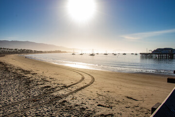 Stearn's Wharf in Santa Barbara California with Pacific Ocean shoreline and boats