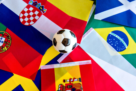 World Cup, Soccer Ball On Top Of Several Flags From Different Countries