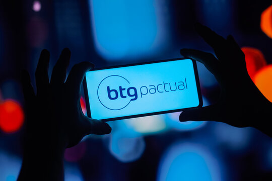 September 12, 2022, Brazil. In this photo illustration the Banking and Trading Group Pactual (BTG Pactual) logo seen displayed on a smartphone.