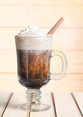 Chocolate milkshake with cream in glass