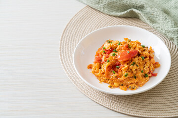 Stir-fried tomatoes with egg or Scrambled eggs with tomatoes