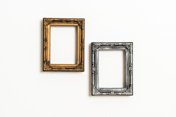 empty picture frame on white wall background