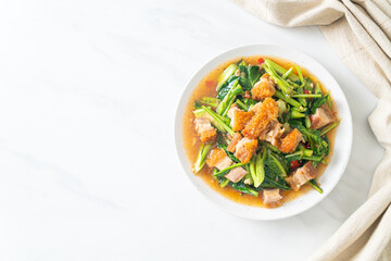 Stir-fried kale vegetable with crispy pork