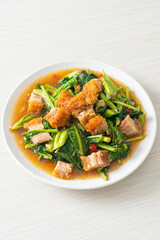 Stir-fried kale vegetable with crispy pork