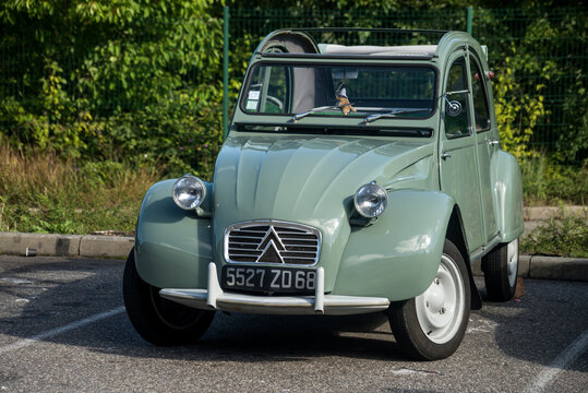Mulhouse - France - 11 September 2022 - Front view of green Citroen 2CV6 parked in the street
