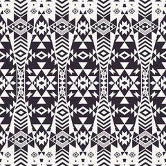 Abstract geometric patchwork. Vector ethnic aztec geometric patchwork black and white color seamless pattern background. Use for fabric, ethnic interior decoration elements, upholstery, wrapping.