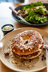 Bagel with pumpkin and cream cheese