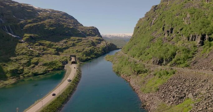 Vehicles drive through a tunnel near Roldasfjellet mountain, Norway.