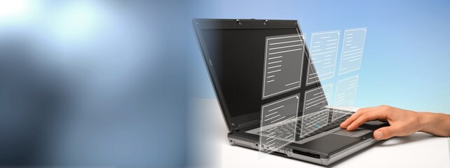 Document Management System consultant working on laptop computer in office