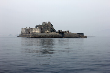 Hashima Island in Nagasaki, Japan. Also called Battleship Island. Gunkanjima, Japan is an abandoned coal mining.  