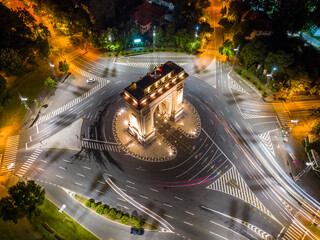 Bucharest, Romania. June, 17th, 2022. 
Aerial night shot of the Arch of Triumph ( Arcul de Triumf)...
