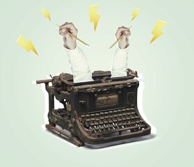 Two hands sticking out typewriter, creating story concept.