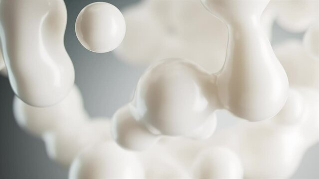 Droplets of white creamy fluid merging together creating metaballs. 3d animation 4k