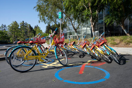 Mountain View, CA, USA - May 1, 2022: Google branded bikes (GBikes) are seen at Googleplex, the headquarters campus of Google and its parent company, Alphabet Inc., in Mountain View, California.