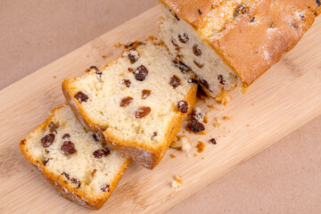 cake with raisins sliced ?? cutting board