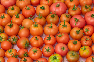 Home grown organic and tasty tomatoes texture close up - Benefits of tomatoes concept