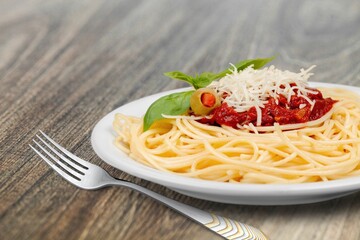 Pasta Spaghetti in plate with sauce, italian cuisine dish.