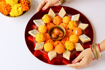 Diwali sweets Mango chum chum barfi petha Laddu Jalebi peda Indian sweet festival dish mithai...