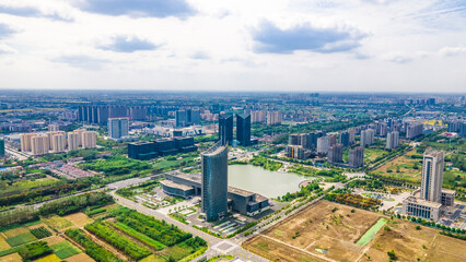 Fototapeta premium Aerial photography of buildings in Dongtai High-tech Industrial Development Zone, Yancheng City, Jiangsu Province, China - Kechuang Building, Wangkun Grand Theater, Internet Building and Customs Build