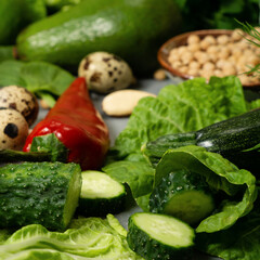 Fresh healthy vegetables with avocado, chickpeas, nuts and herbs for a healthy diet. A balanced diet with fiber and vegetable proteins