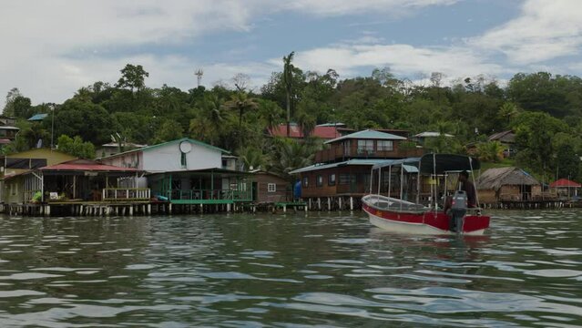 Floating houses in the water near the jungle. Island of Bastimentos, Bocas del Toro, Panama