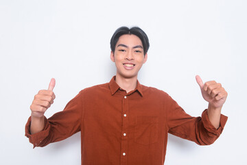 portrait of young man wearing shirt on white background