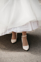 White shoes on women's feet